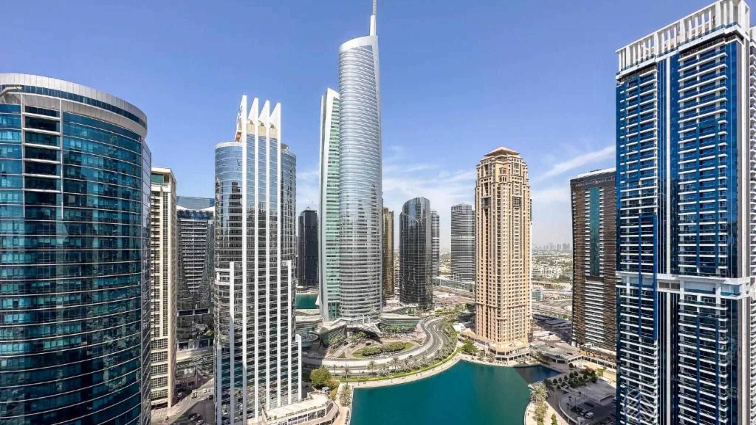 Tall buildings and blue waters of Jumeirah Lake Towers, Dubai