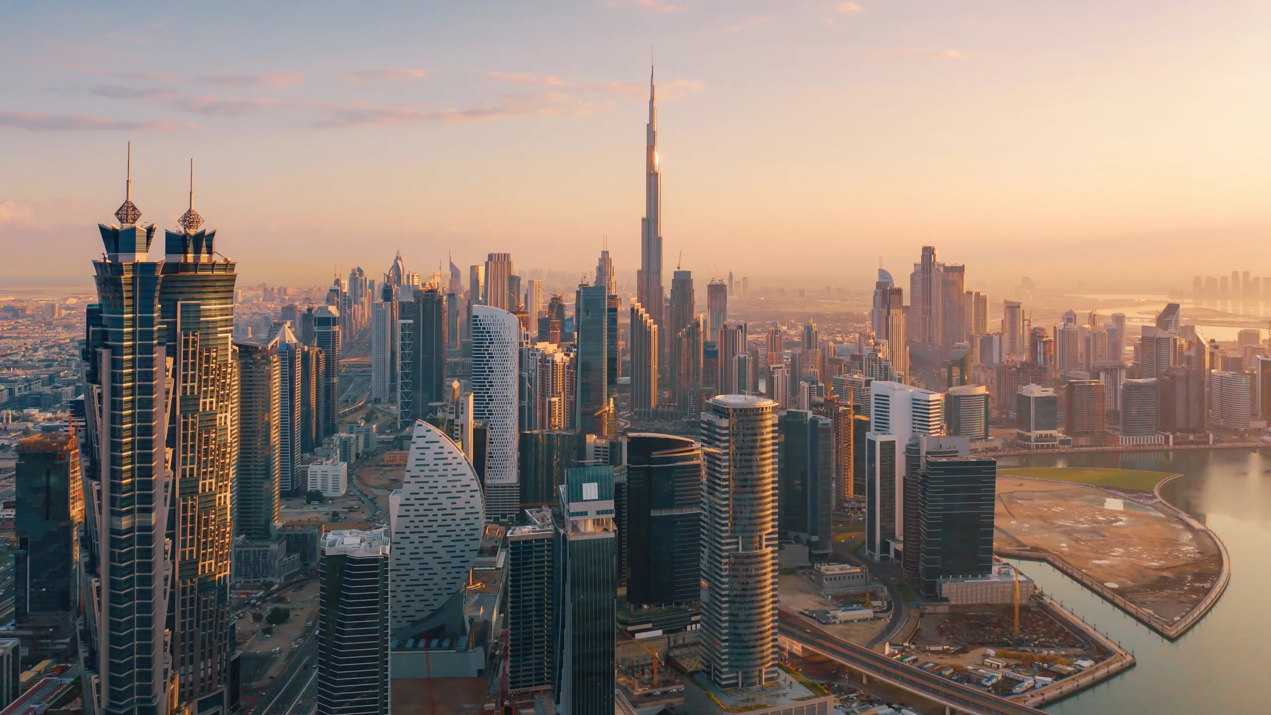 Aerial view of downtown Dubai skyline at sunset